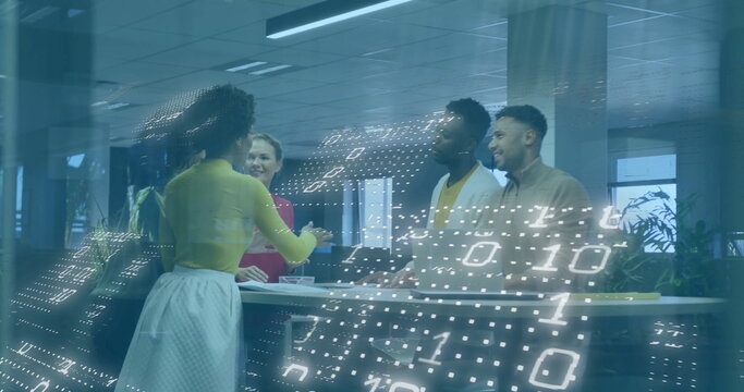 Presenting woman in chartreuse top gesturing to colleagues around office table, binary code overlay