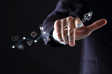 Businessman touch rocket launch investment growth, planning and starting corporate business start...