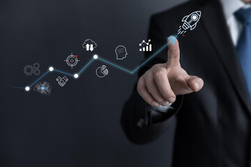 Businessman touch rocket launch investment growth, planning and starting corporate business start up aiming objective value development leadership and customer target group