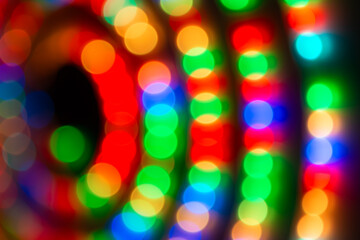 Abstract colorful lights in spiral circle, abstract holiday background