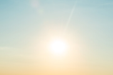 Big shining sun on sunset sky, sunset sky with sun light background