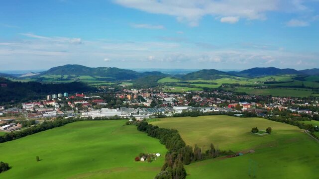 Reveal drone shot czech small city with beskydy mountains