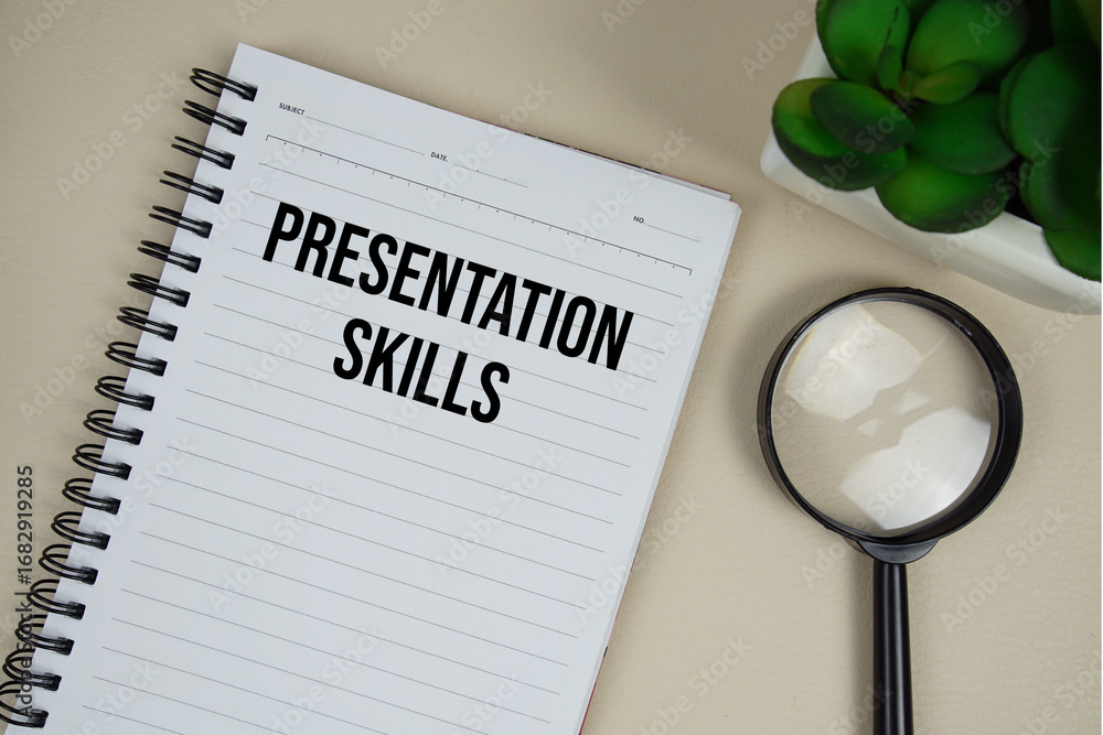 Poster presentation skills text on paper notebook with magnifying glass on beige leather background