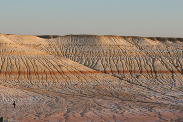 The colorful iron limestone formations of Kyzylkup at sunset, Kazakhstan