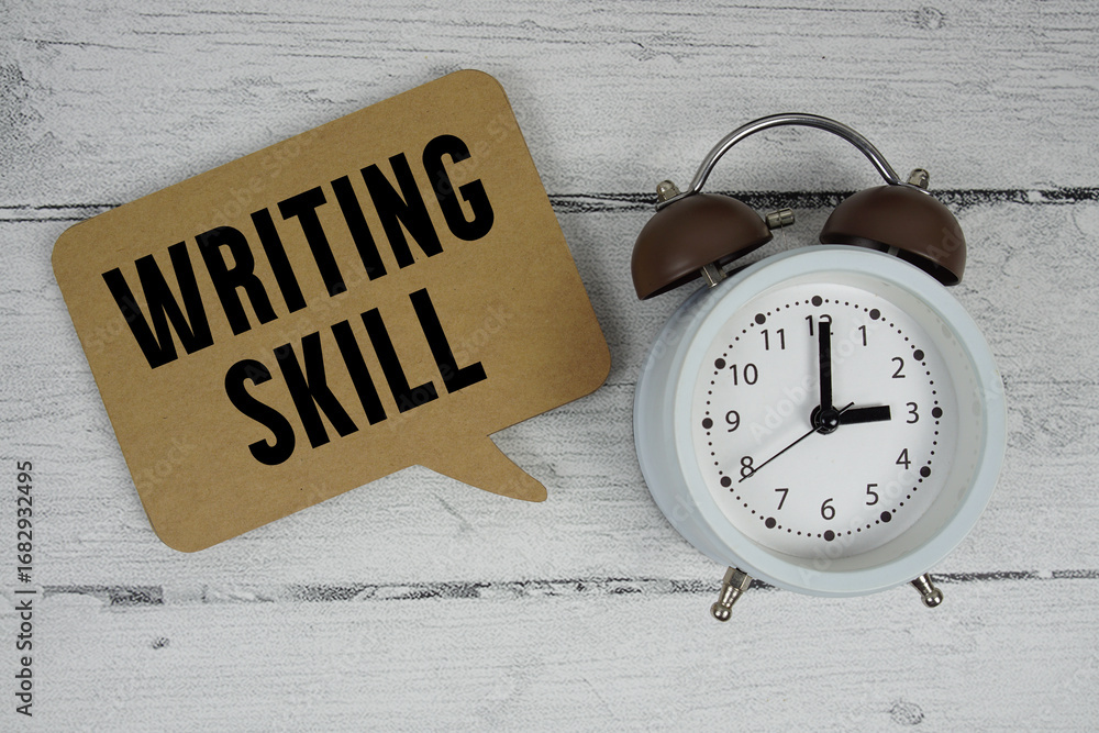Poster writing skill text with alarm clock on wooden background