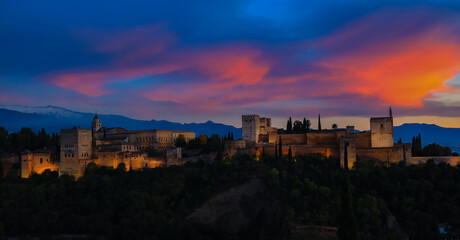 The landscape  view with Alhambra of Granada, Spain. Alhambra fortress and Albaicin quarter at twilight sky scene