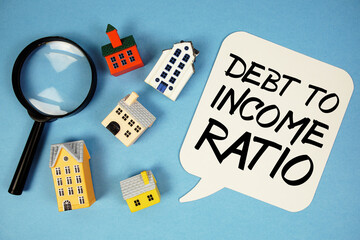 DTI Debt To Income Ratio text with house models on blue background
