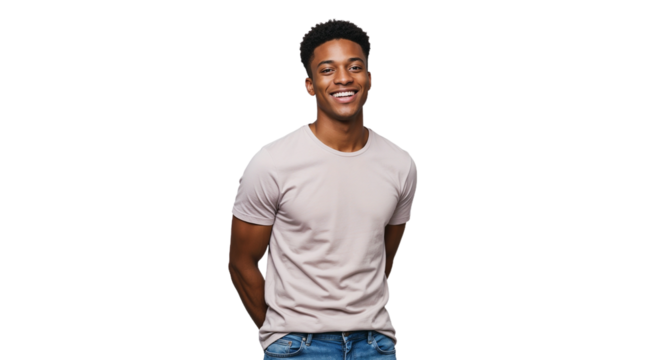 Young man standing confidently with a smile, showcasing relaxed style and positive energy in a bright setting