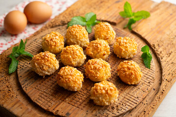 Panellets with pine nuts and almonds. A typical Catalan dessert made with marzipan and nuts.