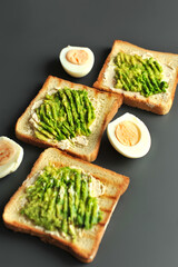 Breakfast consisting of toast with avocado and eggs. Healthy breakfast.
