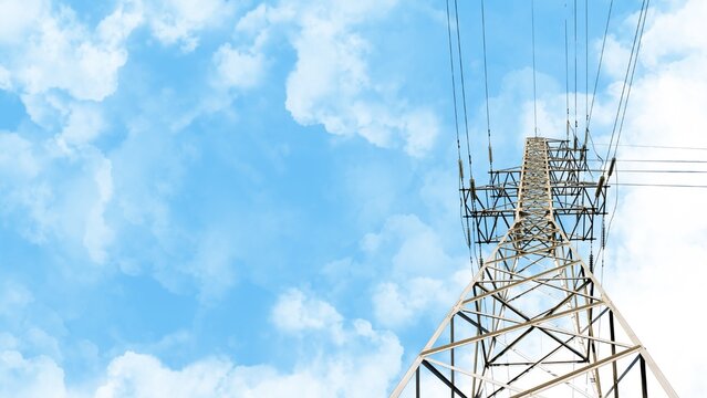 High-Voltage Power Transmission Lines Against a Cloudy Sky