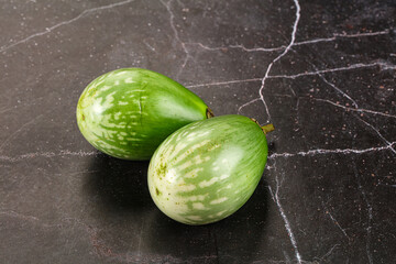 Ripe green mini eggplants heap