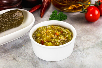 Souce gherkin relish with marinated cucumbers