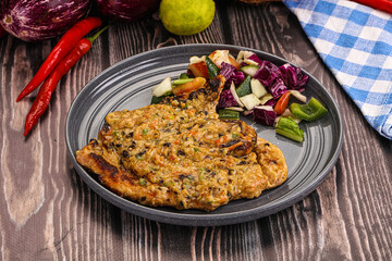 Tasty chicken steak with vegetables