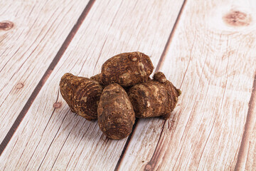 Brown topinambur roots for cooking