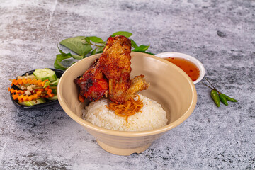Spicy roasted chicken wing with rice