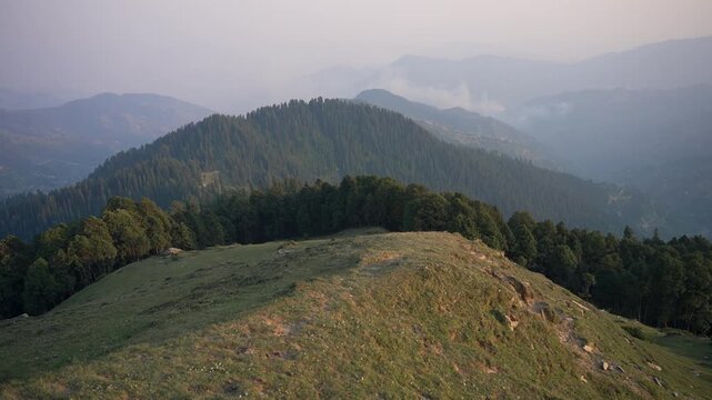 India's breathtaking mountain views boast majestic peaks, lush valleys, and serene landscapes in Shoja Himachal pradesh india.	