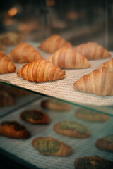 delicious warm bread displayed in a glass display rack (1)