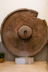 holy broken stone umbrella from history at indoor exhibit