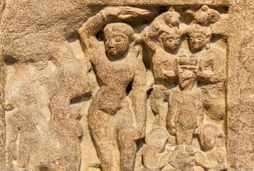 ruined stone relief illustrating buddhist teachings