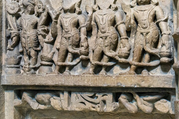 ruined stone relief illustrating buddhist teachings