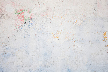 Obraz premium Peeling plaster and paint on the wall as a neutral, calm abstract background.