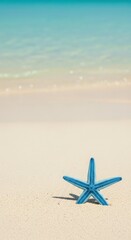 Blue starfish resting on sandy beach with clear ocean waves