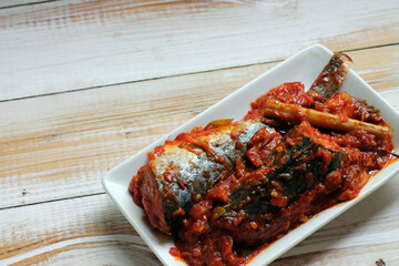 Sarden or Sardencis. Spicy Indonesian mackerel dish served in rich red chili sauce with lemongrass...
