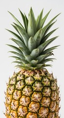 Obraz premium Fresh pineapple isolated on white background with green leaves