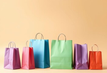 Various sized paper shopping bags, isolated on a beige background,  paper bag,  recyclable