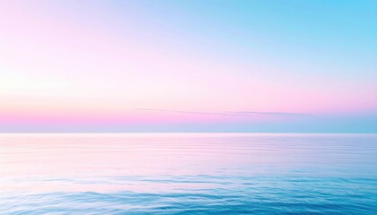 Serene seascape showing a pastel-colored sky transitioning to a calm sea. Soft light creates a dreamy, peaceful atmosphere with gentle ripples on the water's surface