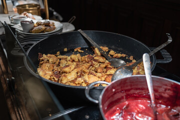 Traditional Viennese Breakfast: Freshly Cooked Kaiserschmarrn with Sweet Plum Compote
