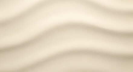 Naklejka premium Soft beige fabric with gentle draping and subtle shadows