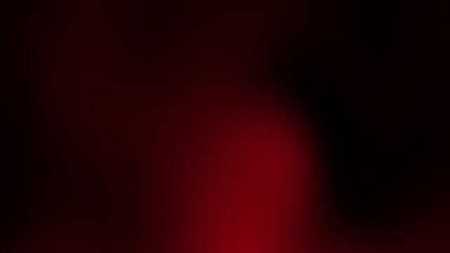 Abstract blurred black and dark red background with dark toned gradiation. Great for backgrounds, backdrops, or desktop wallpapers