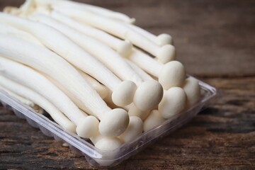 Fresh white shimeji mushrooms in tray