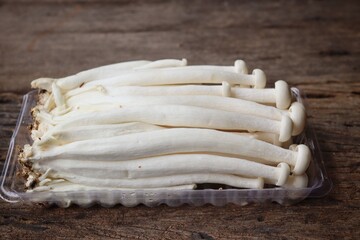 Fresh white shimeji mushrooms in tray