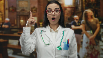Hispanic woman doctor with stethoscope in a church pondering an idea, wearing glasses and white...
