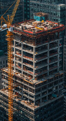 Fototapeta premium High-rise office under construction in bustling city, scaffolding visible 