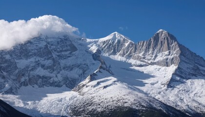 Obraz premium Majestic snow-capped mountains under a clear sky. 9