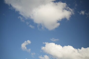 Wispy clouds against a blue sky