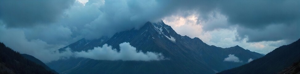 Obraz premium Dramatic Dark Clouds Gather Over Mountain Peak, Impending Storm, Chilling Mist, Powerful Nature Image