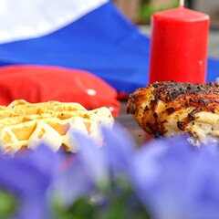 Grilled chicken, waffles, and candles