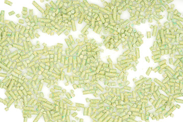 green tea animal litter isolated white background. tofu animal filler. close up. top view