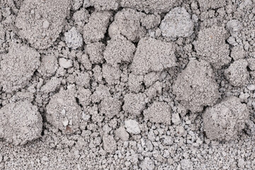 Texture of cracked concrete wall close-up. Damaged stone wall. Destroyed cement. crumbling stone