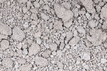 Texture of cracked concrete wall close-up. Damaged stone wall. Destroyed cement. crumbling stone