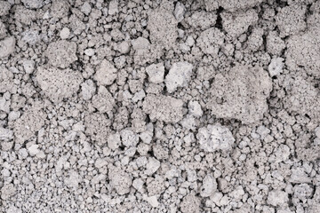Texture of cracked concrete wall close-up. Damaged stone wall. Destroyed cement. crumbling stone