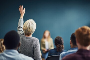 Student Raising Hand in Classroom for Discussion Participation.