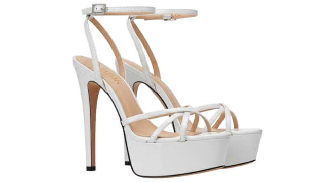 A pair of white high-heel platform sandals with thin straps and an ankle buckle, shot in a studio.