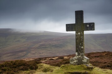 Weathered stone cross on misty hilltop under dramatic cloudy sky with moorland background, evoking solitude and spiritual reflection concept. Ai generative
