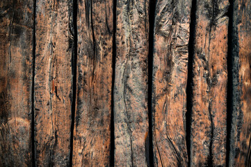 Incredibly beautiful wooden texture background made of aged logs arranged vertically and parallel...
